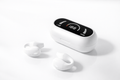 white open-ear wireless earbuds side view
